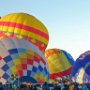 Many balloons inflate together.