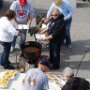 Big crowd getting served beans!