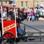 Outhouse racing teams on parade.