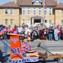 Outhouse racing teams on parade.