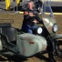 Karen sitting on a Ural at the local BMW/Indian dealership