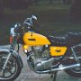 1979 Yamaha 650 Special. After wrecking it, we had it painted yellow and added a king and queen seat.
